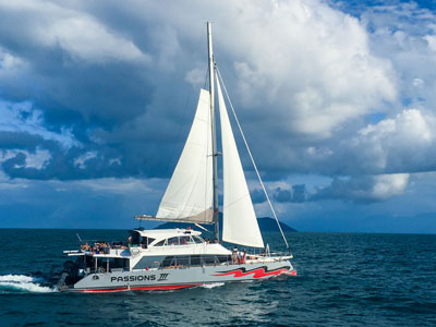 Passions of Paradise catamaran sailing home on Great Barrier Reef